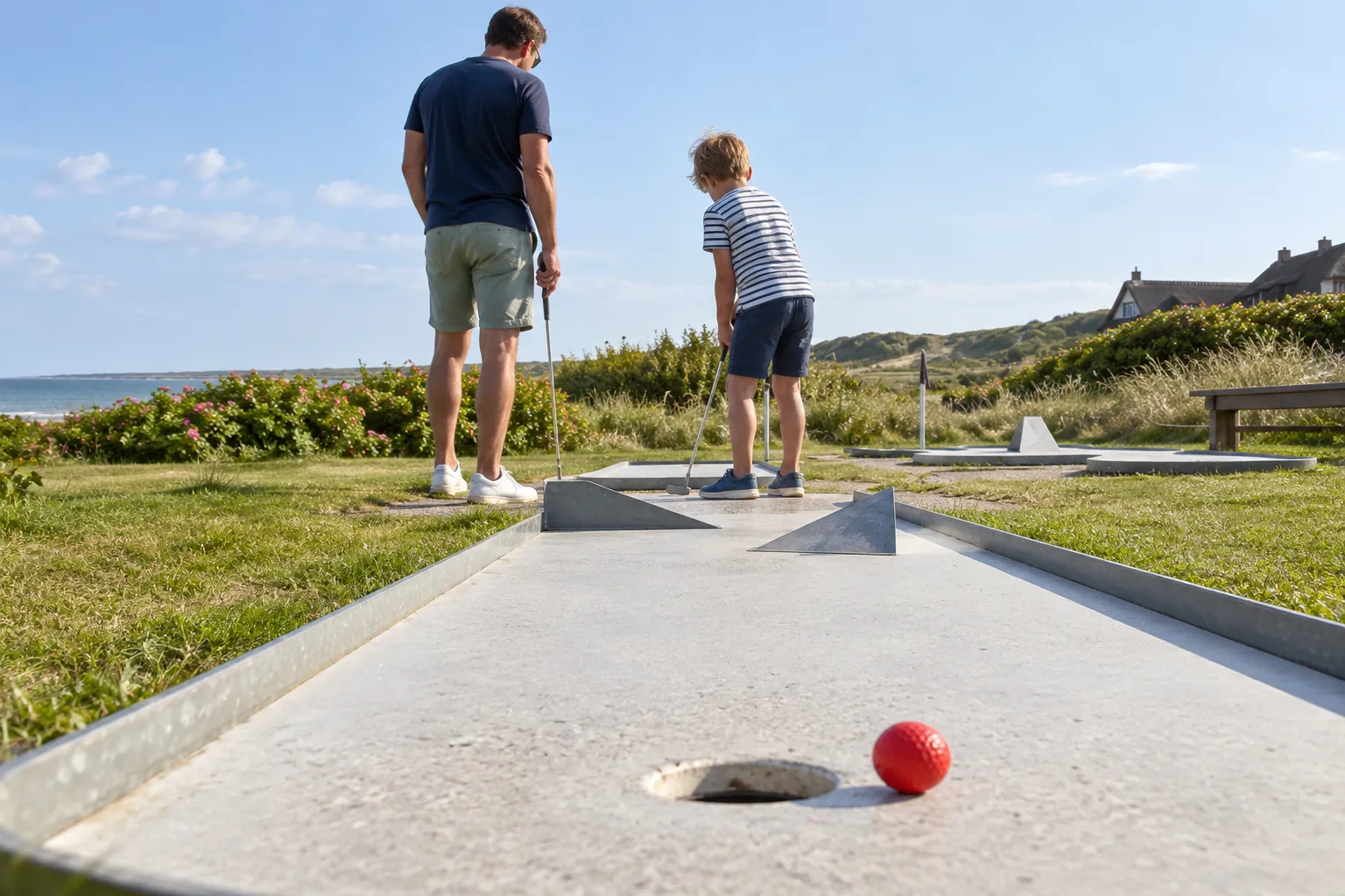 KI-Motiv: Familie auf einer beispielhaften Minigolfanlage